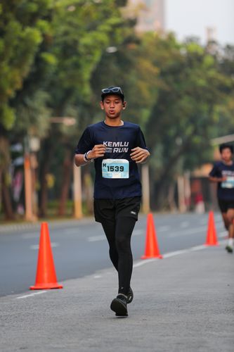 Race photo from KEMLU RUN 2025