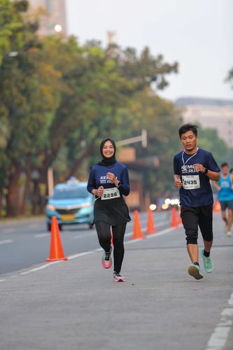 Race photo from KEMLU RUN 2025