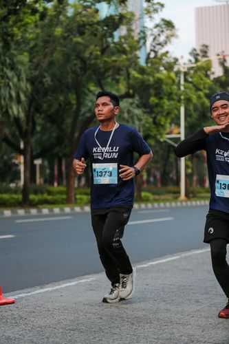 Race photo from KEMLU RUN 2025