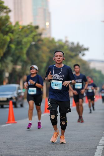 Race photo from KEMLU RUN 2025