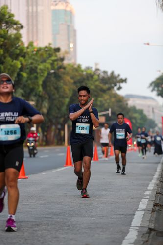 Race photo from KEMLU RUN 2025