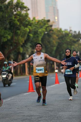 Race photo from KEMLU RUN 2025