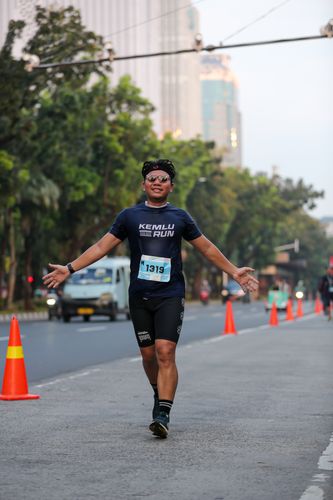 Race photo from KEMLU RUN 2025