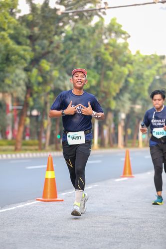 Race photo from KEMLU RUN 2025
