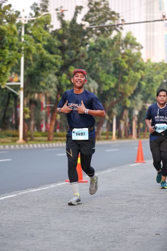 Race photo from KEMLU RUN 2025