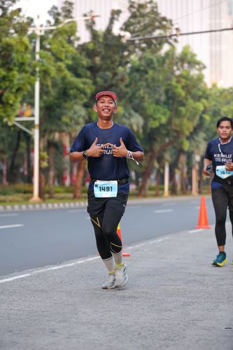 Race photo from KEMLU RUN 2025