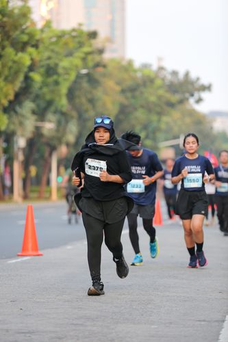Race photo from KEMLU RUN 2025