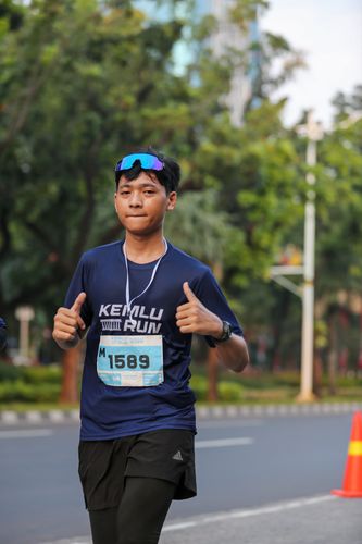 Race photo from KEMLU RUN 2025