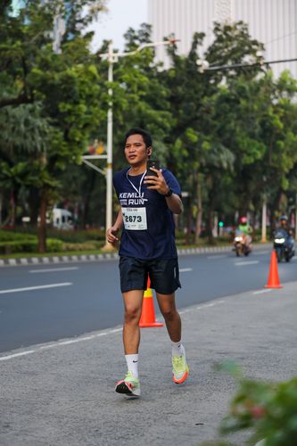 Race photo from KEMLU RUN 2025