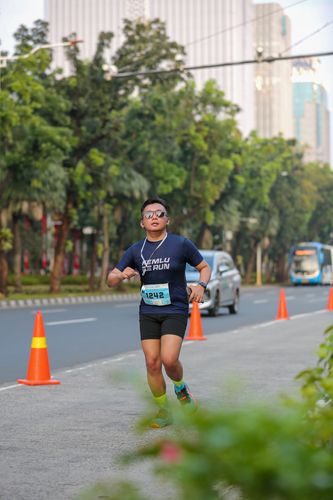 Race photo from KEMLU RUN 2025