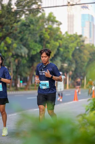 Race photo from KEMLU RUN 2025