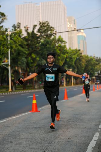 Race photo from KEMLU RUN 2025