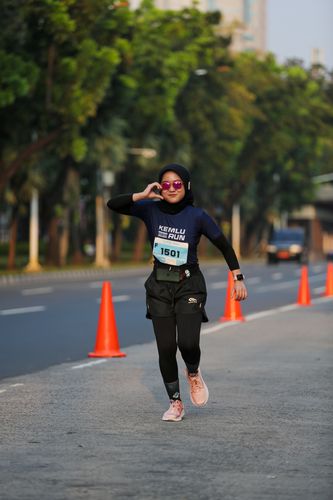 Race photo from KEMLU RUN 2025