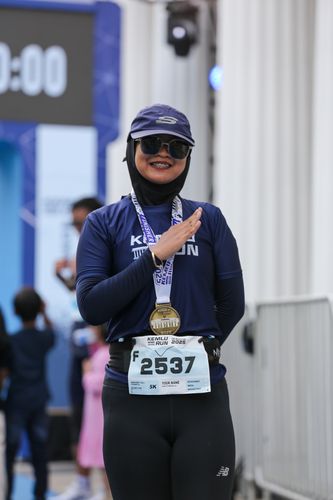 Race photo from KEMLU RUN 2025
