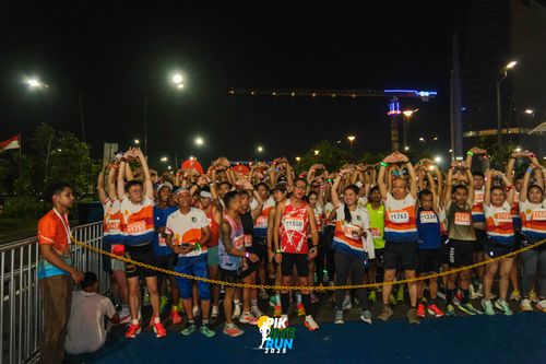 Race photo from PIK NITE RUN 2025