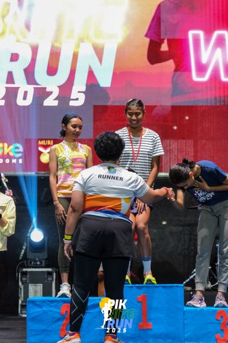Race photo from PIK NITE RUN 2025