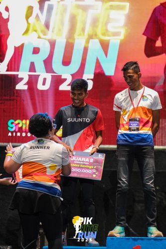 Race photo from PIK NITE RUN 2025