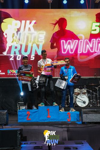 Race photo from PIK NITE RUN 2025