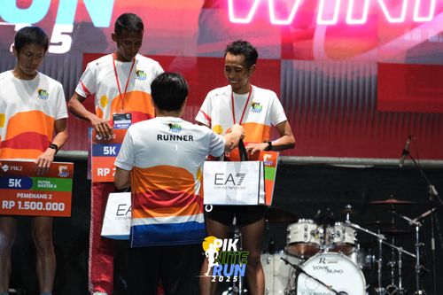Race photo from PIK NITE RUN 2025