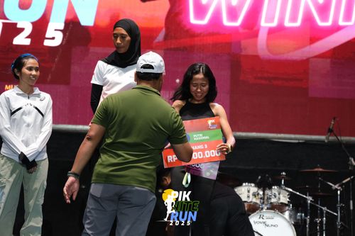 Race photo from PIK NITE RUN 2025