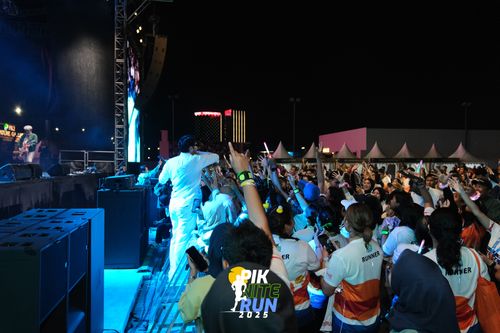 Race photo from PIK NITE RUN 2025