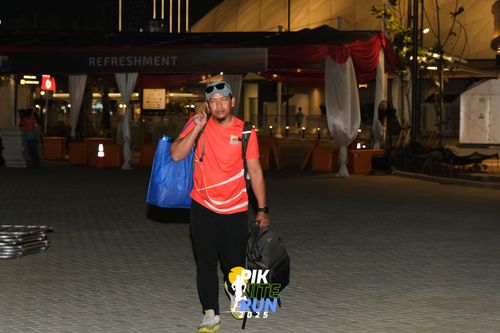 Race photo from PIK NITE RUN 2025