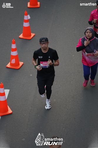 Race photo from Smartfren Run 2025 