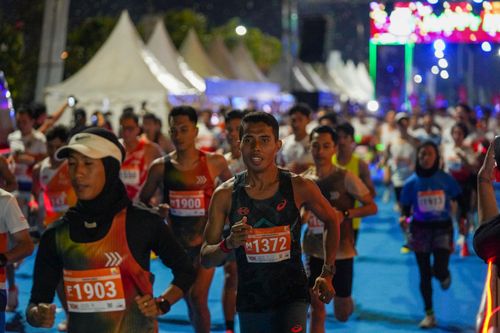 Race photo from PIK NITE RUN 2025