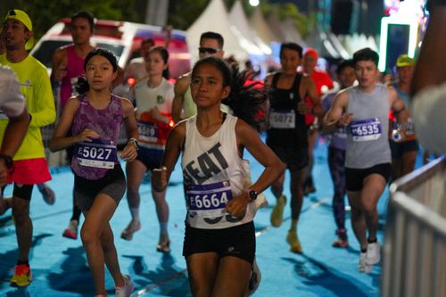 Race photo from PIK NITE RUN 2025