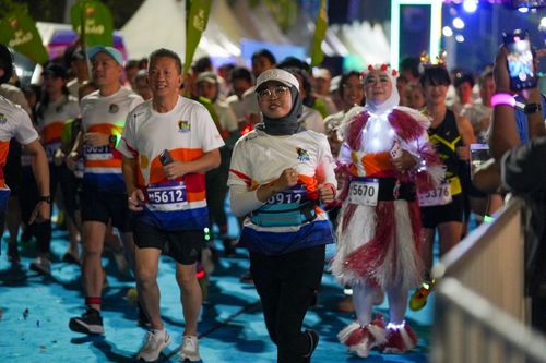 Race photo from PIK NITE RUN 2025