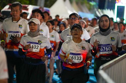 Race photo from PIK NITE RUN 2025
