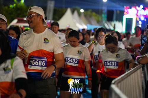 Race photo from PIK NITE RUN 2025