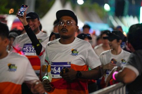 Race photo from PIK NITE RUN 2025