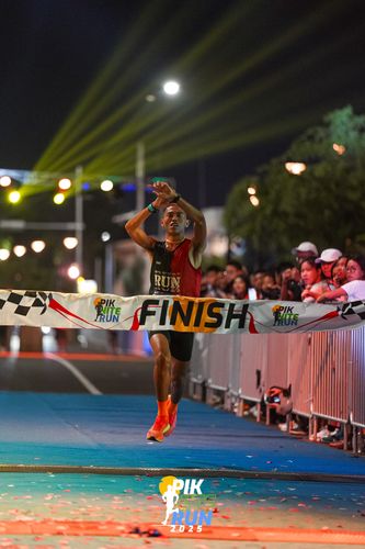 Race photo from PIK NITE RUN 2025