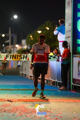 Race photo from PIK NITE RUN 2025