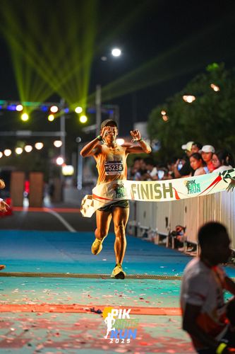 Race photo from PIK NITE RUN 2025