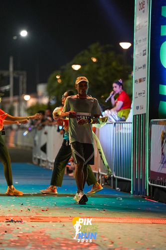 Race photo from PIK NITE RUN 2025
