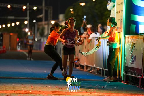 Race photo from PIK NITE RUN 2025
