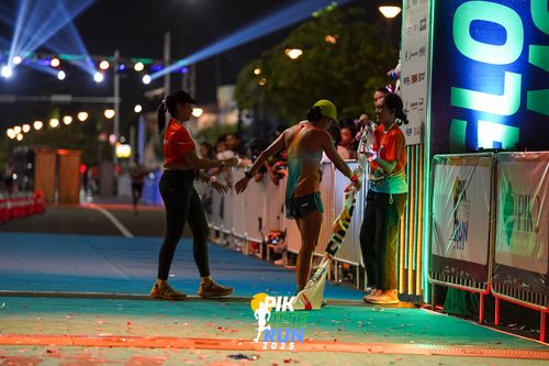 Race photo from PIK NITE RUN 2025