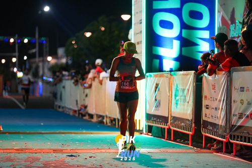 Race photo from PIK NITE RUN 2025