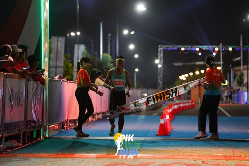 Race photo from PIK NITE RUN 2025