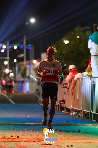 Race photo from PIK NITE RUN 2025