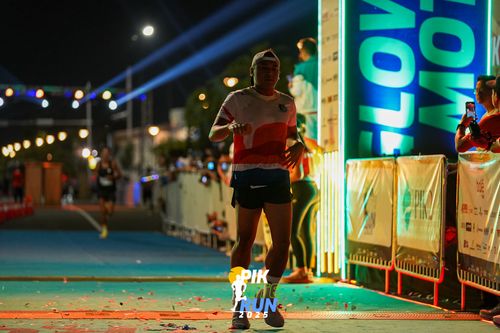 Race photo from PIK NITE RUN 2025