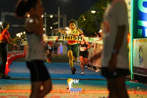 Race photo from PIK NITE RUN 2025