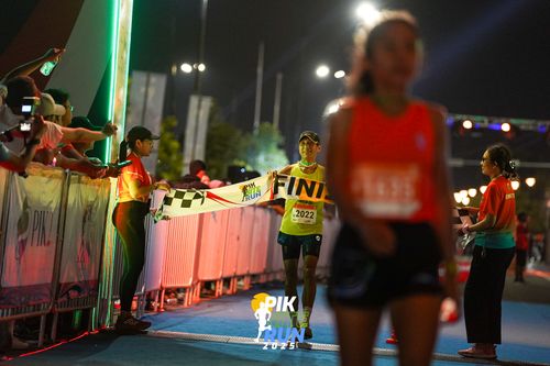 Race photo from PIK NITE RUN 2025