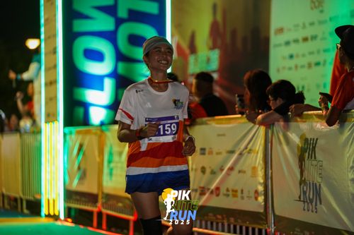 Race photo from PIK NITE RUN 2025
