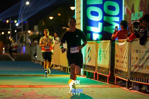 Race photo from PIK NITE RUN 2025