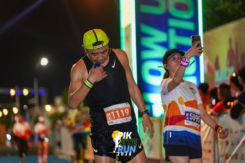 Race photo from PIK NITE RUN 2025