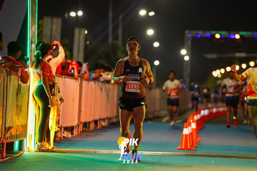 Race photo from PIK NITE RUN 2025