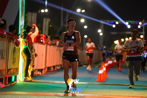 Race photo from PIK NITE RUN 2025